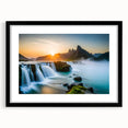 Framed wall art depicting a serene waterfall landscape in vibrant colors, featuring a black mat and sleek black frame, perfect for enhancing home decor.