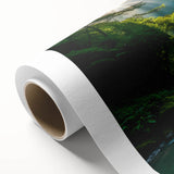 Vibrant rolled canvas wall art featuring a serene waterfall landscape, showcasing lush greenery and cascading water, ideal for home decor. The artwork is elegantly packaged in a protective cardboard tube, ensuring safe delivery.