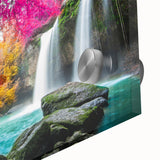 Close-up of a vibrant acrylic glass artwork depicting a serene waterfall landscape, showcasing detailed textures and vivid colors, ideal for home decor.