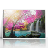 Framed wall art collection showcasing a serene waterfall landscape design in vibrant blues and greens, set against a sleek white acrylic frame for modern decor. Perfect for adding a tranquil touch to living spaces or offices.