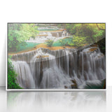 Framed acrylic wall art collection featuring a serene waterfall landscape design, set in a sleek white frame, perfect for modern home decor and nature enthusiasts.