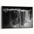 Framed canvas wall art showcasing a serene waterfall landscape, featuring vibrant colors and intricate details, with a sleek black frame enhancing its modern aesthetic. Ideal for home decor, this piece brings tranquility and natural beauty to any space.