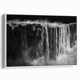 Framed canvas wall art showcasing a serene waterfall landscape design, featuring vibrant blues and greens, ideal for home decor and nature enthusiasts.
