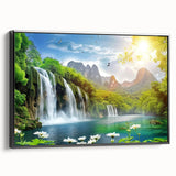 Framed canvas wall art showcasing a serene waterfall landscape with lush greenery and vibrant blues, designed to enhance home decor with a calming aesthetic.