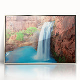 Framed acrylic wall art depicting a serene waterfall landscape with lush greenery and vibrant colors, perfect for enhancing home decor and creating a calming ambiance.