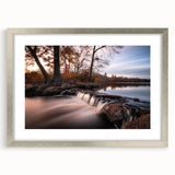 Framed wall art showcasing a stunning waterfall landscape design in vibrant colors, with a sleek silver mat and frame, ideal for home decor enhancement.