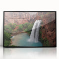 Framed acrylic wall art showcasing a serene waterfall landscape design, featuring vibrant colors and sleek black frame, ideal for home decor enhancement.