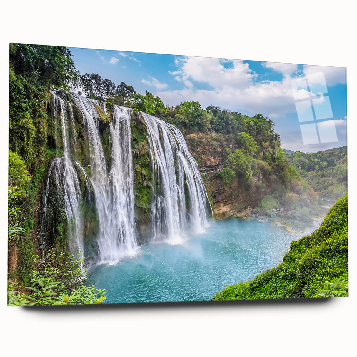 Acrylic wall art collection showcasing a vibrant landscape waterfall design, viewed from the side, displaying its sleek finish and modern aesthetic, ideal for home decor.
