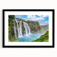 Framed wall art collection showcasing a stunning landscape waterfall design, featuring a sleek black frame and mat, perfect for enhancing any home decor.