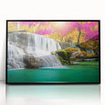 Framed acrylic wall art featuring a serene landscape with a cascading waterfall, surrounded by lush greenery, ideal for enhancing home decor with nature-inspired aesthetics.