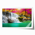 Stunning landscape wall art print showcasing cascading waterfalls surrounded by lush greenery, rolled for easy shipping and display in any decor setting.