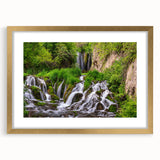 Framed wall art collection showcasing a stunning waterfall landscape design with a gold mat border, ideal for enhancing home decor and creating a serene atmosphere.