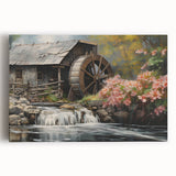 Stretched canvas wall art featuring a serene landscape of a watermill surrounded by lush greenery, ideal for home decor. The vibrant colors and intricate details enhance any room's aesthetic.