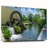 Acrylic glass wall art featuring a serene landscape of a tranquil watermill, showcasing vibrant colors and intricate details, perfect for home decor.