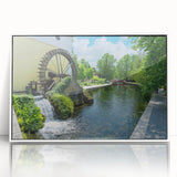 Framed acrylic wall art showcasing a serene watermill landscape design, featuring soft colors and intricate details, perfect for enhancing home decor aesthetics.