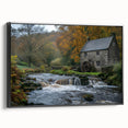 Framed wall art piece showcasing a serene watermill landscape design, featuring a black frame and canvas print, perfect for home decor and artistic ambiance.
