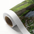 Rolled canvas artwork showcasing a serene watermill landscape design, featuring vibrant colors and intricate details, perfect for home decor and artistic ambiance.