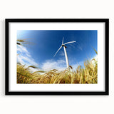 Black-framed wall art featuring a serene landscape with windmills, presented with a mat for an elegant finish, perfect for enhancing home decor aesthetics.