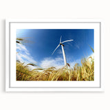 Framed wall art featuring a serene landscape with windmills, showcasing a white mat and sleek frame, perfect for adding a touch of tranquility to home decor. Ideal for nature lovers and art enthusiasts.