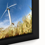 Framed canvas wall art featuring a vibrant landscape with windmills, showcasing intricate details and rich colors, perfect for home decor and enhancing interior spaces.