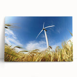 Stretched canvas wall art showcasing a serene landscape with windmills against a vibrant sunset backdrop, perfect for home decor and enhancing interior aesthetics.