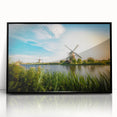 Framed acrylic wall art featuring a serene landscape with windmills, showcasing vibrant colors and intricate details, perfect for home decor enhancement.