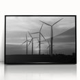 Framed wall art featuring a serene landscape with windmills, showcasing a black acrylic frame and vibrant colors, ideal for home decor and artistic ambiance.