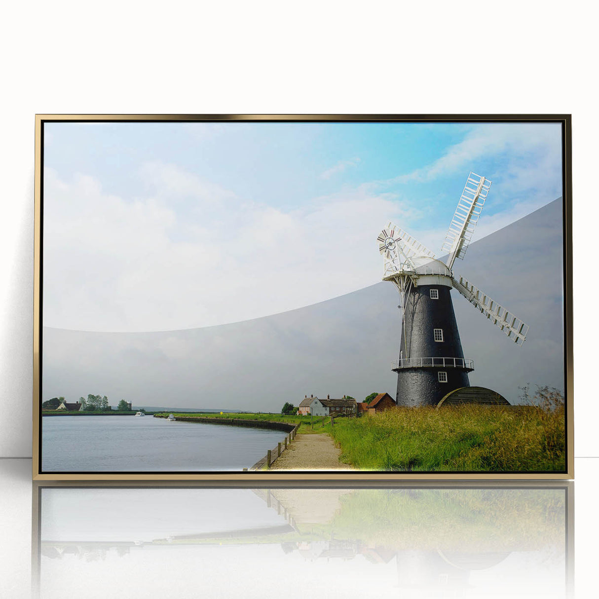 Framed acrylic wall art featuring a picturesque landscape with windmills, highlighted by a gold border, perfect for home decor. Ideal for enhancing interior aesthetics.