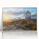 Framed wall art collection showcasing serene landscapes with windmills, featuring a white frame and acrylic front for a modern touch, ideal for home decor.