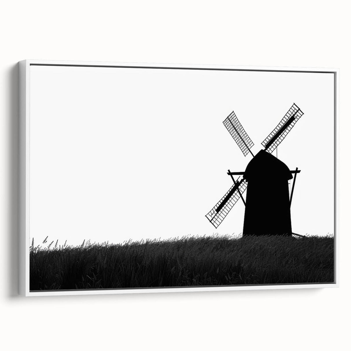 Framed canvas wall art showcasing a serene landscape with windmills against a clear blue sky, designed to add a tranquil atmosphere to home decor.