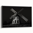 Framed canvas wall art showcasing a vibrant windmill landscape design, featuring a black frame and side view, perfect for home decor enthusiasts.