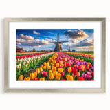 Framed wall art collection showcasing a serene landscape with windmills, featuring a sleek silver frame and a white mat, perfect for enhancing home decor.