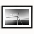 Framed wall art collection showcasing a scenic landscape with windmills, featuring a sleek black frame and white mat for an elegant presentation. Ideal for home decor enthusiasts.