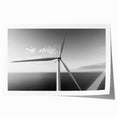 Rolled print showcasing a vibrant landscape with iconic windmills, perfect for home decor, featuring rich colors and intricate details, packaged securely in a cardboard tube.