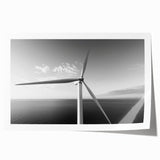 Rolled print showcasing a vibrant landscape with iconic windmills, perfect for home decor, featuring rich colors and intricate details, packaged securely in a cardboard tube.