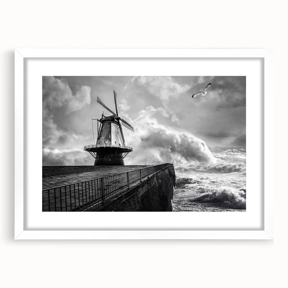 Framed wall art featuring a serene landscape of windmills against a vibrant sunset, with a white mat and frame, perfect for home decor enhancement.