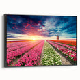 Framed canvas wall art showcasing a stunning landscape with windmills, featuring a black frame and vibrant colors, perfect for enhancing modern home decor.