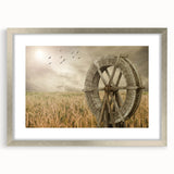 Framed wall art featuring a serene landscape of windmills against a picturesque sky, showcasing a silver mat and frame for an elegant home decor touch. Ideal for enhancing living spaces with tranquil artistry.