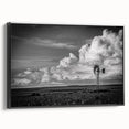 Framed canvas wall art featuring a serene landscape with windmills, showcasing vibrant colors and intricate details, perfect for enhancing home decor.
