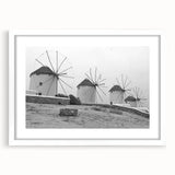 Framed landscape wall art featuring a serene windmill scene, with a white mat border, perfect for home decor or office settings, enhancing any wall space.