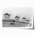 Vibrant landscape wall art print showcasing windmills against a sunset backdrop, rolled and ready for framing, ideal for home decor enthusiasts.