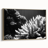 Framed canvas wall art showcasing a vibrant marine life and coral design in gold tones, ideal for beach-themed decor. Perfect for adding color to living spaces.