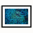 Framed black wall art featuring a vibrant marine life coral design, showcasing intricate details of colorful corals and aquatic creatures, perfect for ocean-themed decor.