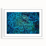 Framed wall art featuring a vibrant coral reef design, showcasing intricate marine life details in bright colors, perfect for ocean-themed décor.