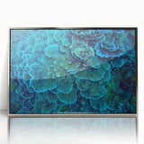 Framed acrylic wall art showcasing a vibrant marine life coral design, featuring intricate details in blue and orange hues, perfect for ocean-themed decor.
