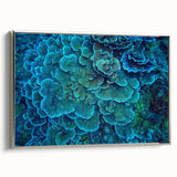 Framed canvas wall art showcasing a vibrant marine life and coral design, presented in a sleek silver frame, perfect for enhancing coastal-themed interiors.