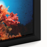 Close-up of a framed canvas wall art piece showcasing vibrant marine life, including colorful corals and sea creatures, perfect for ocean-themed decor.