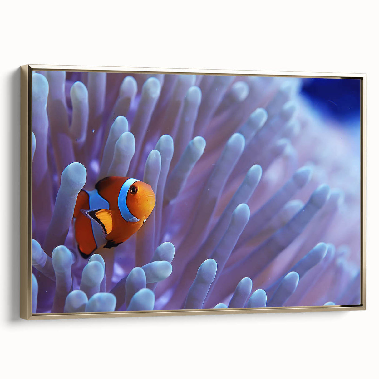 Framed wall art showcasing a vibrant marine life coral design, featuring intricate details in gold hues, perfect for coastal-themed decor or ocean lovers.