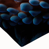 Vibrant close-up of a marine life coral design wall art piece on stretched canvas, showcasing intricate details and bright colors, perfect for ocean-themed decor.