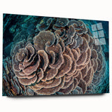 Vibrant acrylic glass wall art showcasing intricate coral reef marine life design, presented in a side view that highlights its glossy finish and depth. Ideal for ocean-themed decor.